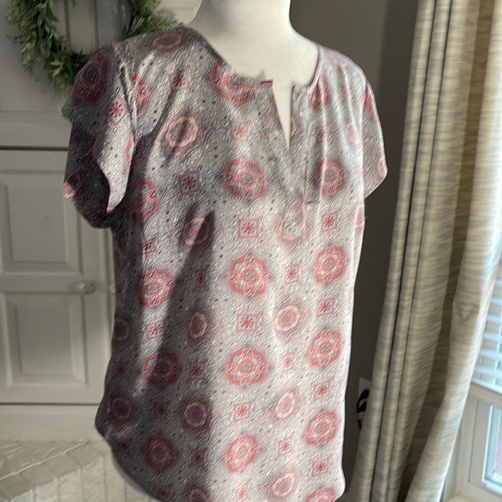 Medallion print, short sleeve blouse.